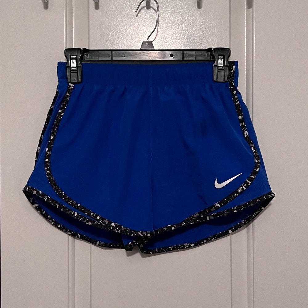 Blue nike shorts with detailing
